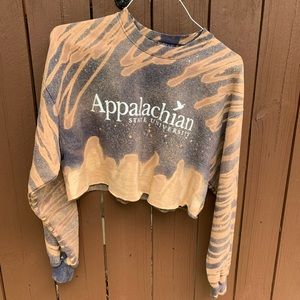 Up-cycles cropped and bleach dyed sweatshirt